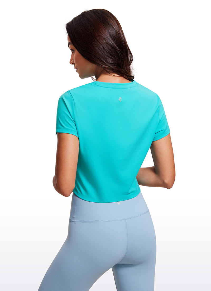 CRZ YOGA Women's Yoga Classic Fit Top Butterluxe Cropped Short Sleeves Spectral Blue